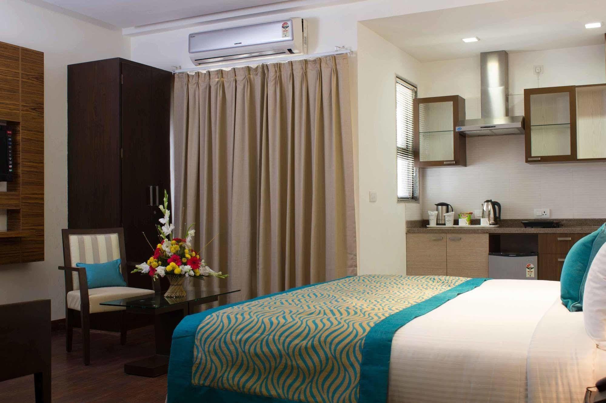 Stately Suites Mg Road Gurgaon Exterior foto